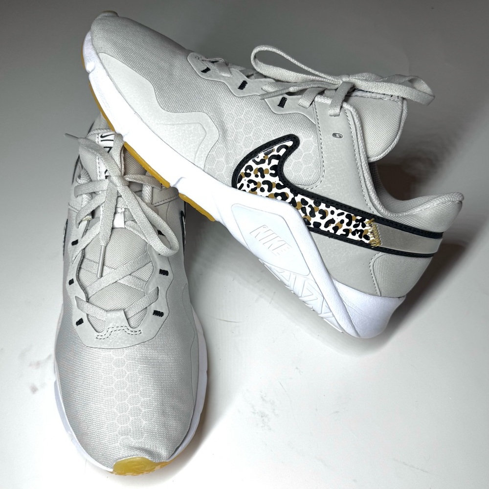 Nike Women’s Light Gray Sneakers with Leopard Swoosh and Yellow Accents